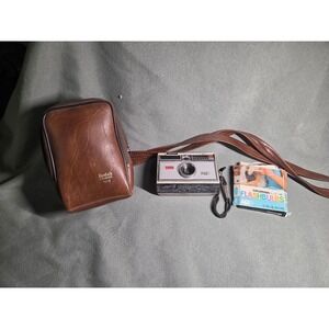 Vintage Kodak Instamatic 100 Camera with Brown Leather Tote Case and Flashbulbs
